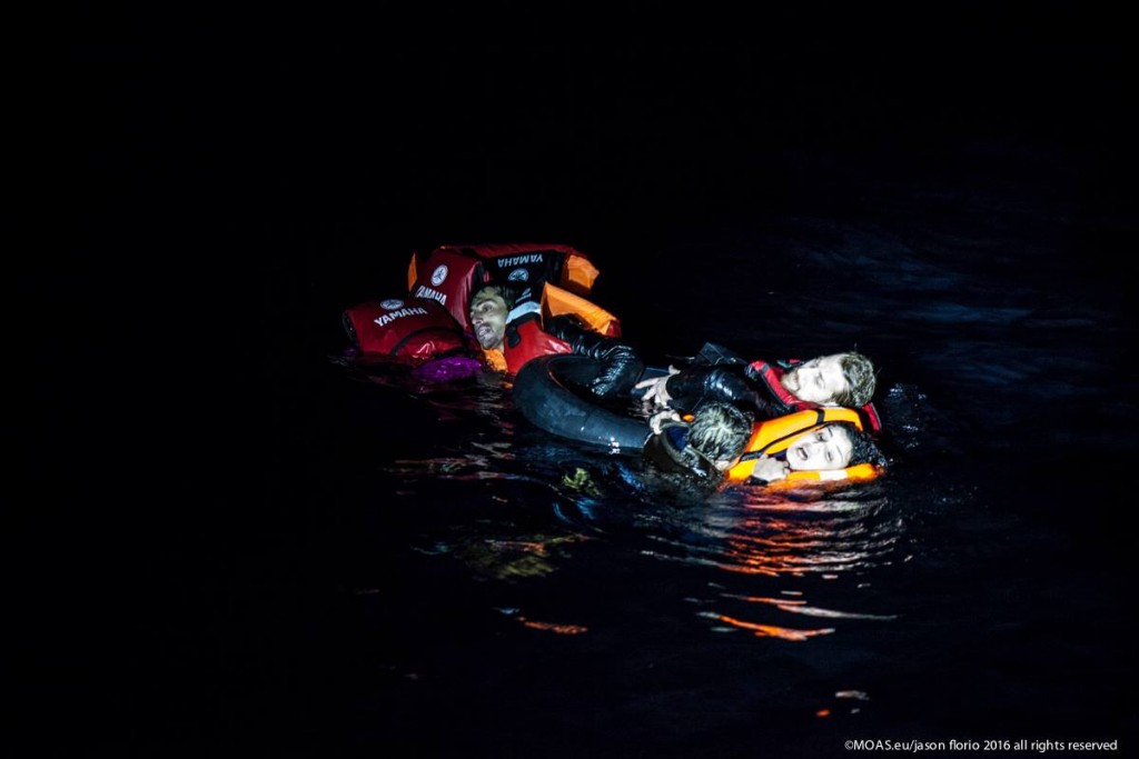 Rescue Swimmers approach the survivors off Agathonisi. Photo: MOAS.eu/ Jason Florio