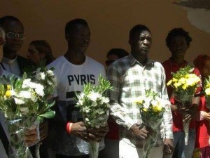 Flowers for the 13 unnamed victims of the April 18 tragedy in which some 850 migrants are believed to have lost their lives.