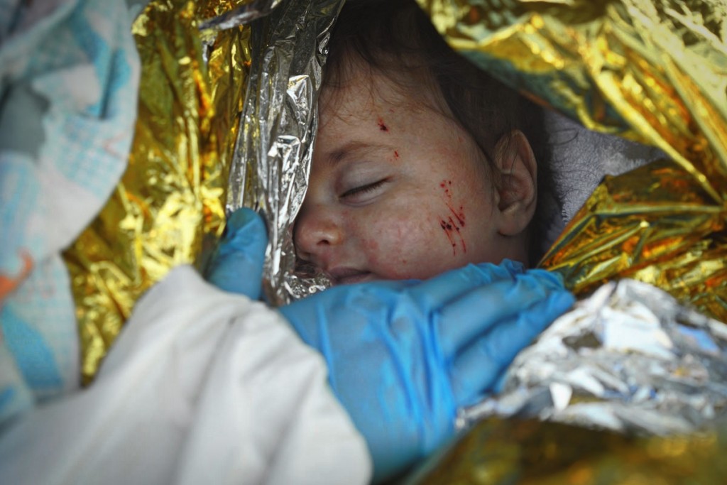 Many of the survivors had to be treated for hypothermia, including this three-month-old boy. Photo: MOAS/Robert Young Pelton