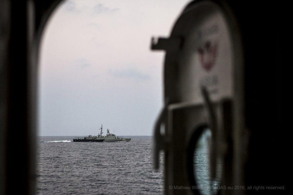 A Thai Navy vessel approaches the MY Phoenix off the coast of Ranong, Thailand. Photo: Mathieu Willcocks/MOAS.eu